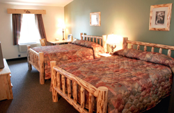 Two Queen beds in comfortable, spacious surroundings.